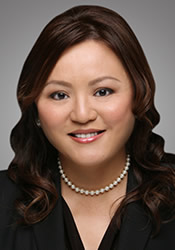 Maggie L Huang